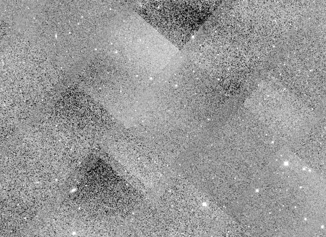 An early attempt to combine the images, with visible seams where stars do not align.